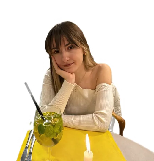 Симона, отпускаща се в кафене